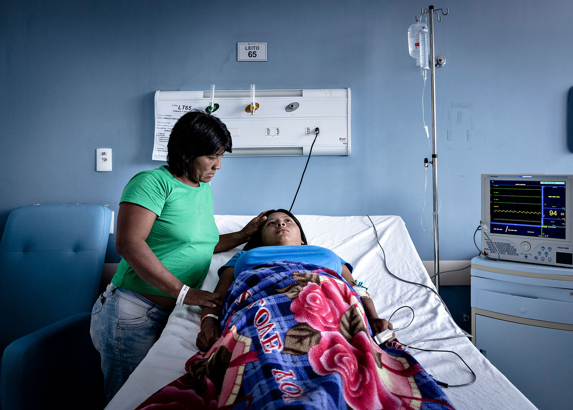 A venezuelan woman watches to her daughter hospitalized due to measles, 2019. 