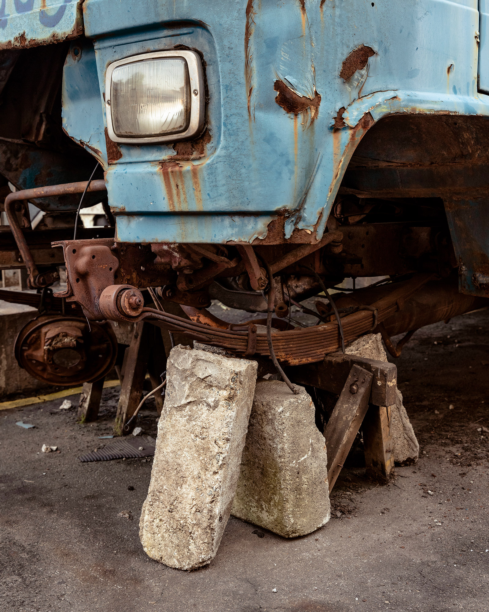 Someone had robbed this truck's wheel