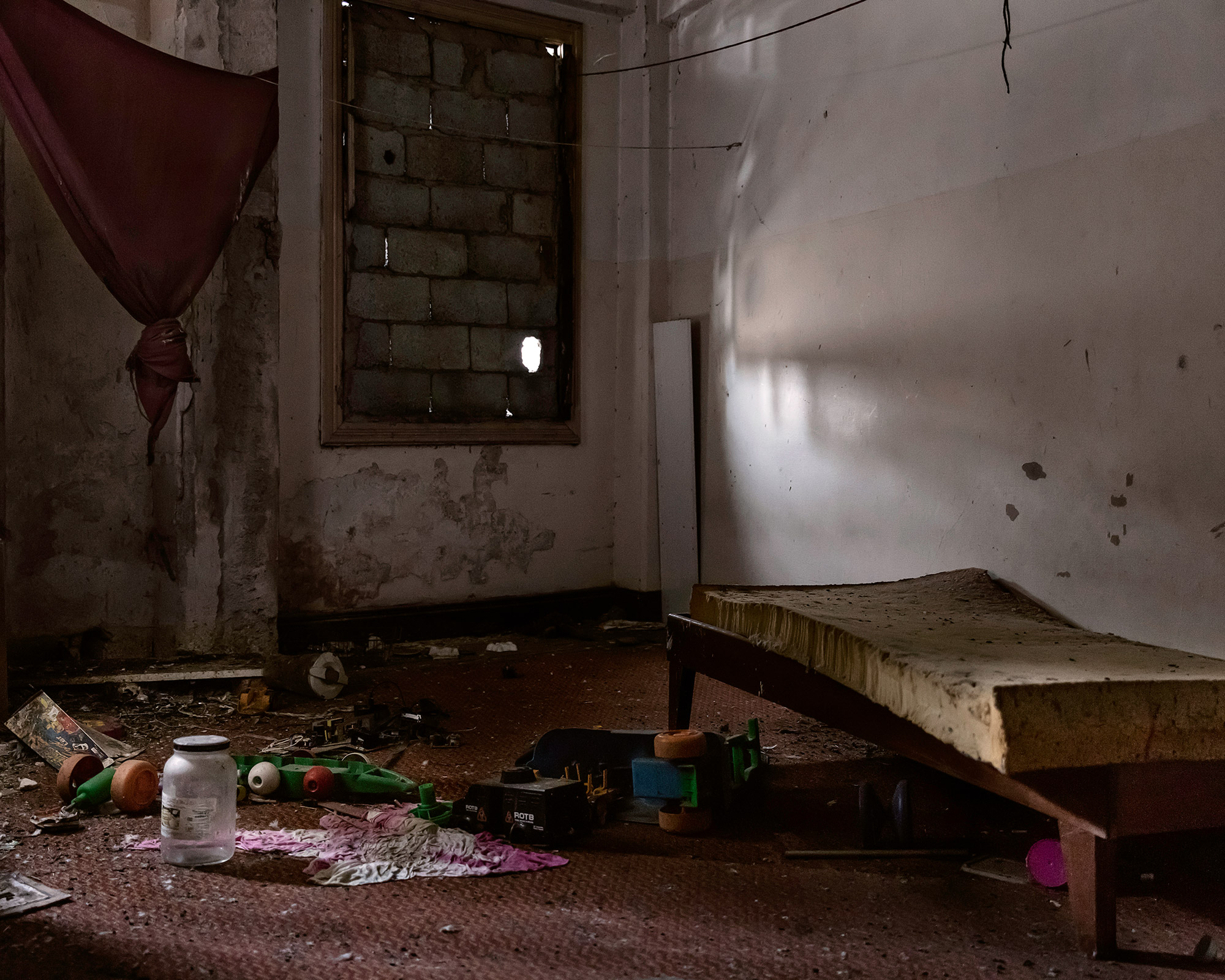 A drug house's room.